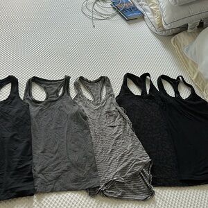 Lululemon assorted tanks all size 4 except the 1st race all black tee size 2